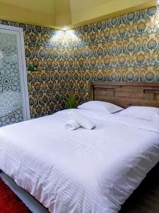 Кровать или кровати в номере Andalusia Farm Resort Whole Farm +98 фотографий