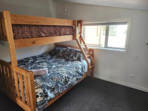 En eller flere senge i et værelse på Peninsular Lakefront