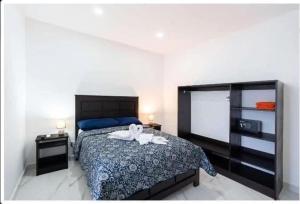 Una cama o camas en una habitación de Havana Jaco