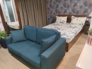 Ένα ή περισσότερα κρεβάτια σε δωμάτιο στο Halo Urban Suite