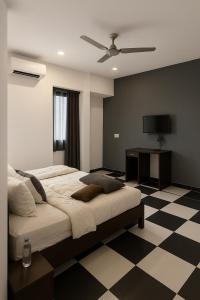 Ένα ή περισσότερα κρεβάτια σε δωμάτιο στο the big boss classic