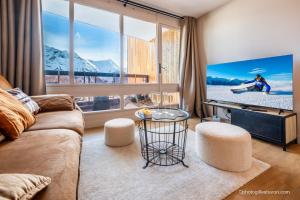 Χώρος καθιστικού στο Appartement pieds des pistes et commerces