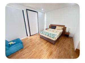 En eller flere senge i et værelse på Chincha CasaLed y jacuzzis sol todo el año