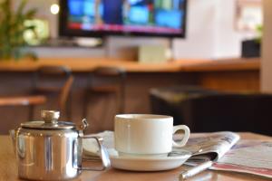 TV a/nebo společenská místnost v ubytování Stay Inn Manchester
