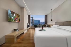 Ένα ή περισσότερα κρεβάτια σε δωμάτιο στο ProjectionPlayground +49 φωτογραφίες