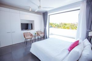 Postel nebo postele na pokoji v ubytování VILLA 5 BED ROOMS SANCTUARY HỒ TRÀM ll Private Beach ll BBQ + 71 fotografií