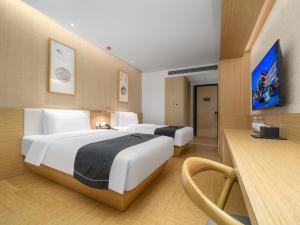 Μια τηλεόραση ή/και κέντρο ψυχαγωγίας στο Jianguo Puyin Hangzhou Qianjiang New City Sijiqing Qingchun Plaza Store