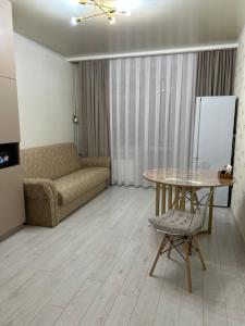 Χώρος καθιστικού στο VIP квартира гостиничного типа Jana Qala