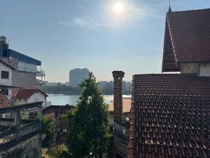 a view of a city with a river and buildings at Four Seasons Serenity Studio - SDhousing branch in Hanoi