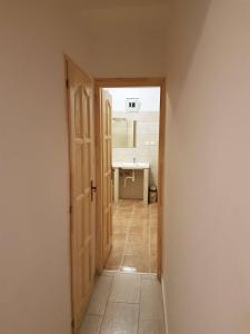 Koupelna v ubytování Beno apartmanok