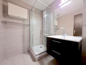 Koupelna v ubytování Grand studio - Emplacement idéal pied des pistes + 19 fotografií