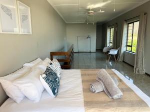 Ένα ή περισσότερα κρεβάτια σε δωμάτιο στο Kingfish Cove +25 φωτογραφίες