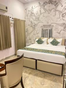 Postel nebo postele na pokoji v ubytování Stamps By Eight Continents, Pushkar