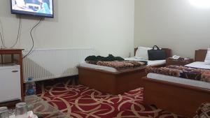 Μια τηλεόραση ή/και κέντρο ψυχαγωγίας στο Hotel Qasr-e-Naz