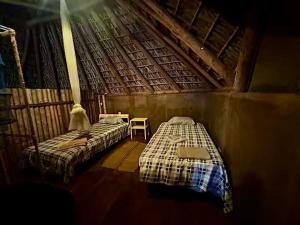 Ένα ή περισσότερα κρεβάτια σε δωμάτιο στο Villa Naila