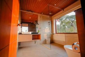 Fotografie z fotogalerie ubytování The Odyssey Coorg v destinaci Madikeri + 38 fotografií