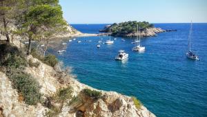 a group of boats in a large body of water at Hotel Rural Can Maries in Puerto de San Miguel