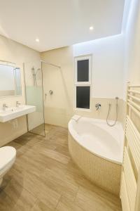 Koupelna v ubytování Work & Travel Lodge Münsingen + 5 fotografií