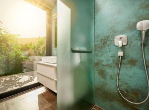 a bathroom with a shower and a sink at Villa Katina in Sućuraj +19 photos