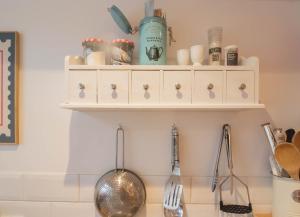 Køkken eller tekøkken på Pebbles Apartment By Air Premier + 11 billeder