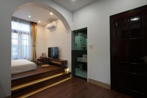 TV a/nebo společenská místnost v ubytování Nana Villa Hue + 51 fotografií