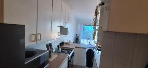 Køkken eller tekøkken på Wayne's Place + 14 billeder