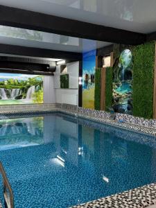 Πισίνα στο ή κοντά στο KAMIR Guest House