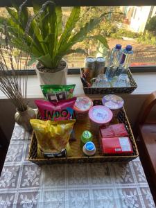 a table with two baskets of food on a table at SaPa Global Hotel in Sapa