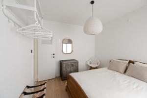 Ένα ή περισσότερα κρεβάτια σε δωμάτιο στο d'Oville d'Ostende