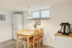 Kuchyň nebo kuchyňský kout v ubytování Villa Room + 5 fotografií