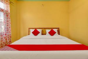 En eller flere senge i et værelse på Hotel O by OYO Wooden Cave By M2 + 27 billeder