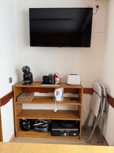 Et tv og/eller underholdning på Appartement les 2 Alpes