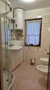 Ένα μπάνιο στο Appartamento La Casa di Violetta +15 φωτογραφίες