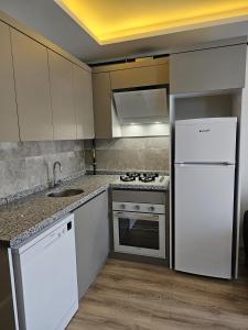 Køkken eller tekøkken på Yaşam Apart