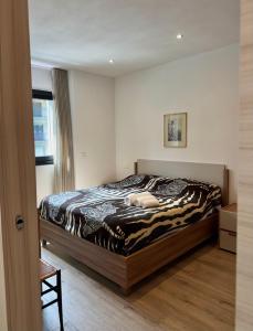 Postel nebo postele na pokoji v ubytování Sogno Alpino