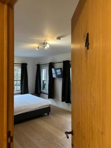 Giường trong phòng chung tại Logies-Bistro Rosa +3 ảnh