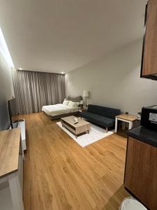 a living room with a couch and a coffee table at سكينة هاوس in Riyadh