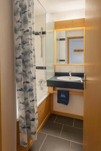 Koupelna v ubytování Appartement Eskival skis aux pieds