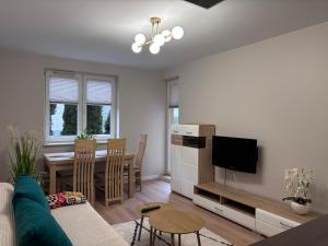Μια τηλεόραση ή/και κέντρο ψυχαγωγίας στο Apartament Nowowiejska, osiedle zamknięte, 24h szybkie zameldowanie!