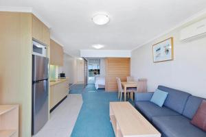 Køkken eller tekøkken på 1 Bedroom Waterfront Apartment - Rooftop Pool & Spa