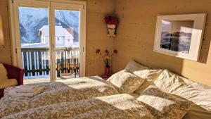 Postel nebo postele na pokoji v ubytování Imhof Alpine B&B Apartments