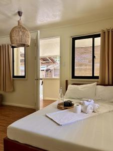 Postel nebo postele na pokoji v ubytování Bundal Riverside