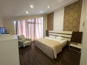 Ένα ή περισσότερα κρεβάτια σε δωμάτιο στο Travel Inn Bakuriani