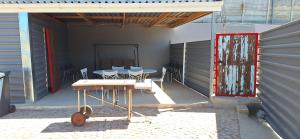 En terrasse eller udendørsområde på Family Cottage no 4