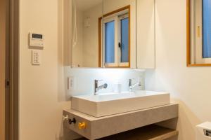 Koupelna v ubytování Mori Sapporo + 85 fotografií