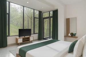 TV a/nebo společenská místnost v ubytování Homestay Horizon kasauli