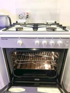 Kuchyň nebo kuchyňský kout v ubytování EC HomeStay