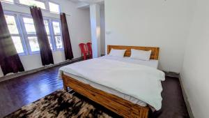 Ένα ή περισσότερα κρεβάτια σε δωμάτιο στο Accomoon hotels