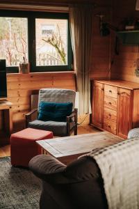 Ένα ή περισσότερα κρεβάτια σε δωμάτιο στο Osada Bura Polana