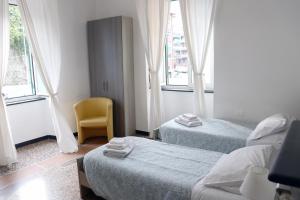 Giường trong phòng chung tại ALBERGO LOCANDA DIANA